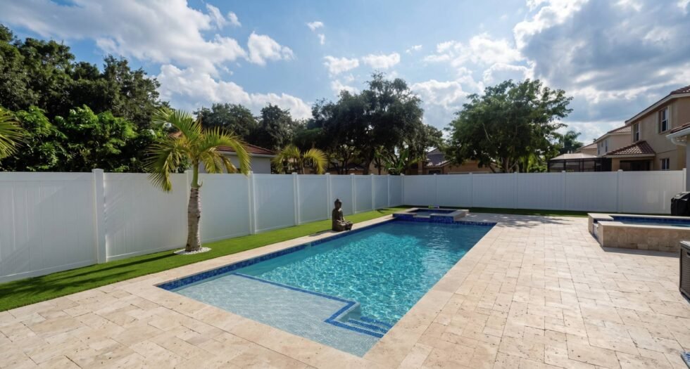 Gunite pool with modern finish in a Pembroke Pines residential backyard